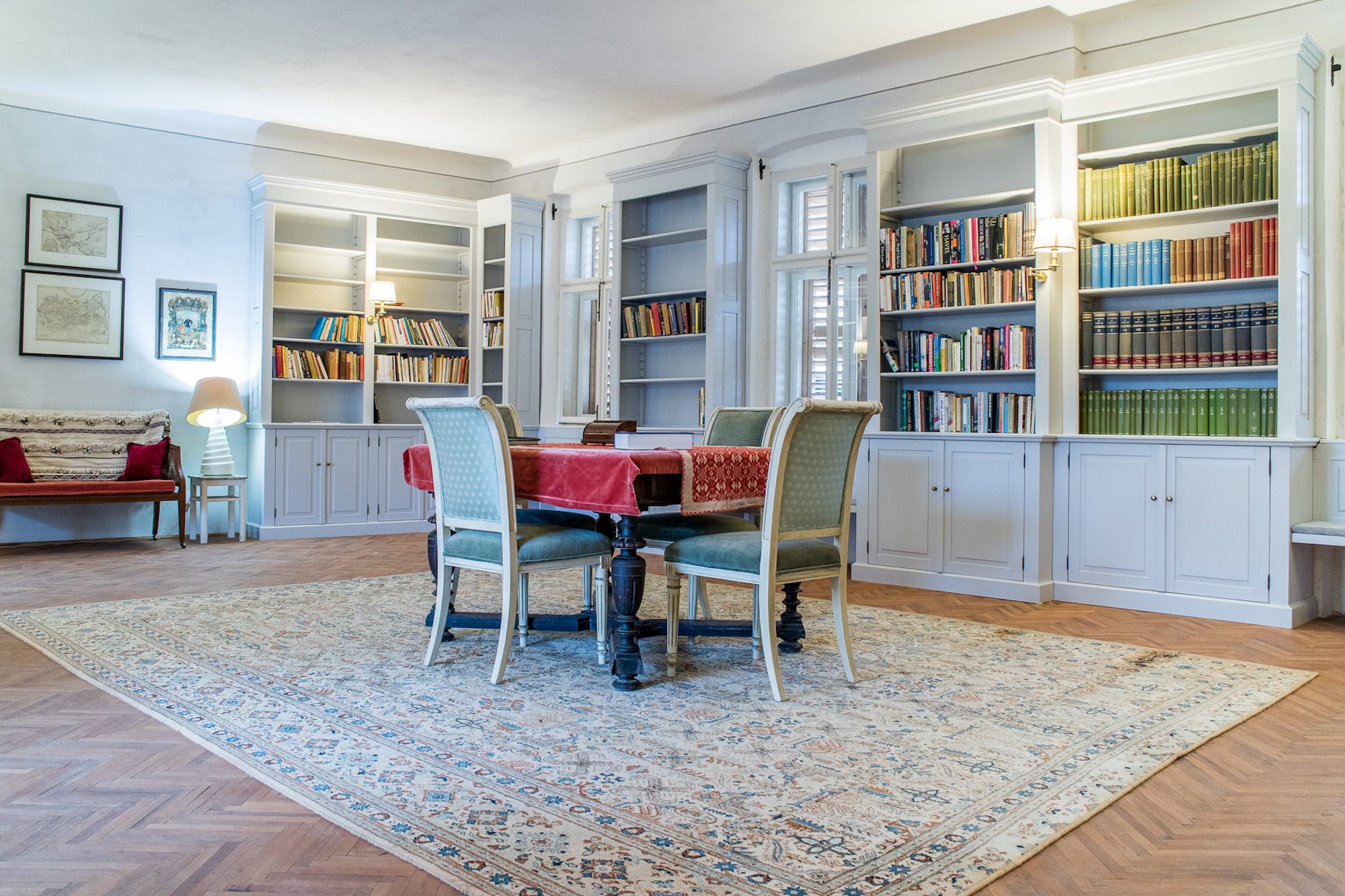 Library inside Saxon manor house in Richiș, filled with vintage books and Saxon heritage décor, part of our immersive and cultural guided tour experience in Romania