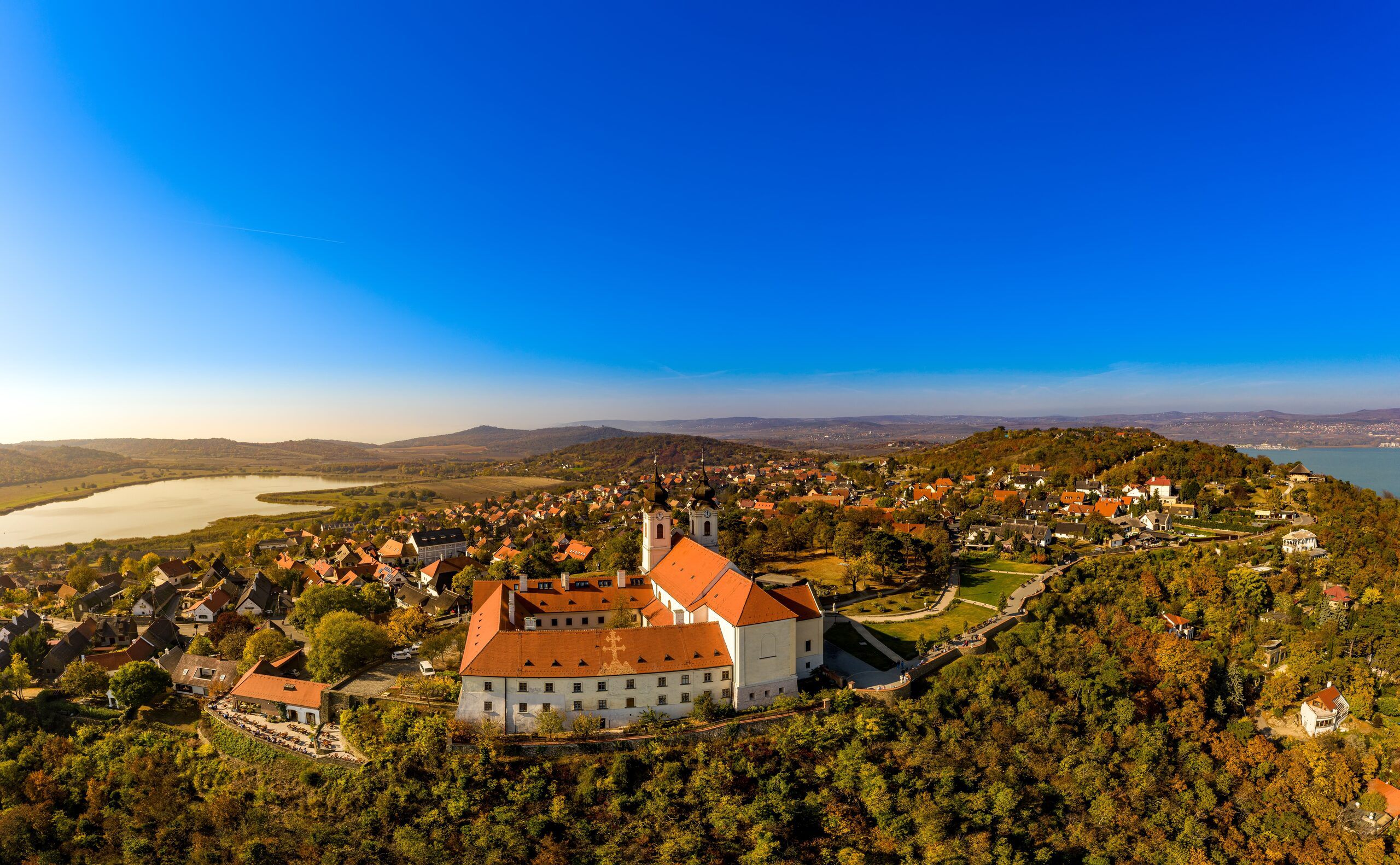 Aerial view of Tihany Abbey and its village on the peninsula above Lake Balaton